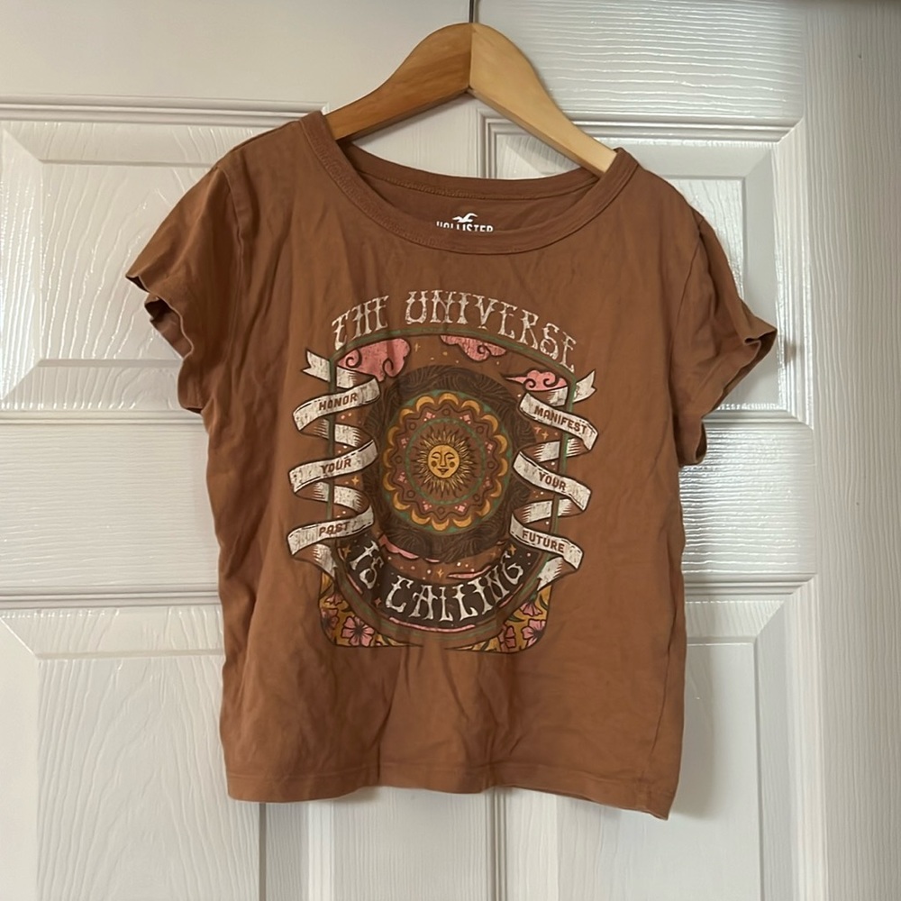 Hollister: “The Universe” t-shirt. Baby tee. Size XS